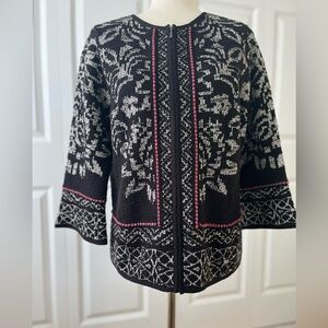 Chico’s sweater with front zipper.